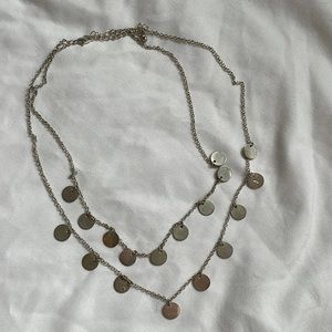 Adjustable necklace.